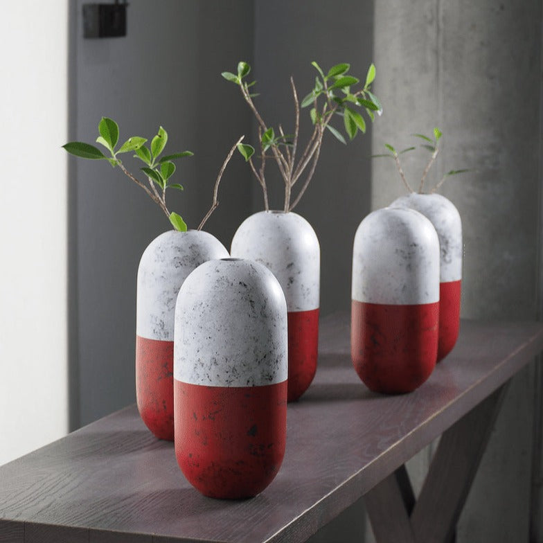 Handicraft sustainable and recycled paper vase from Asia. The home decor vase is made of recycled paper and is sold online on www.qacrafts.com.