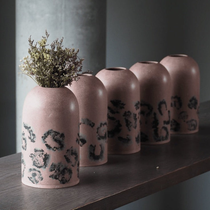 Handicraft sustainable and recycled decorative vase from Asia. The home decor vase is made of recycled paper and is sold online on www.qacrafts.com.