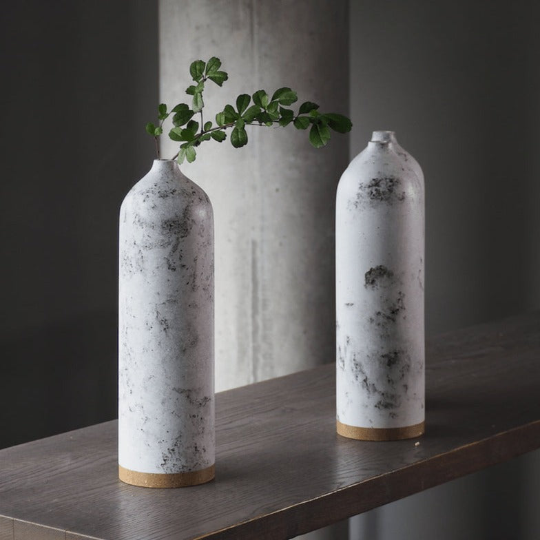 Handicraft sustainable and recycled paper vase from Asia. The home decor vase is made of recycled paper and is sold online on www.qacrafts.com.