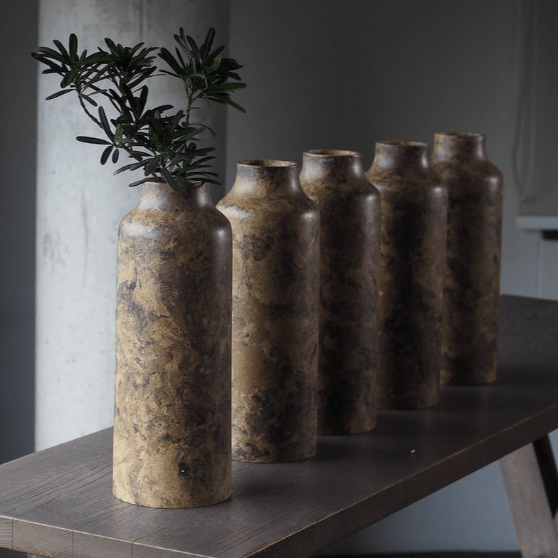 Handicraft sustainable and recycled paper vase from Asia. The home decor vase is made of recycled paper and is sold online on www.qacrafts.com.