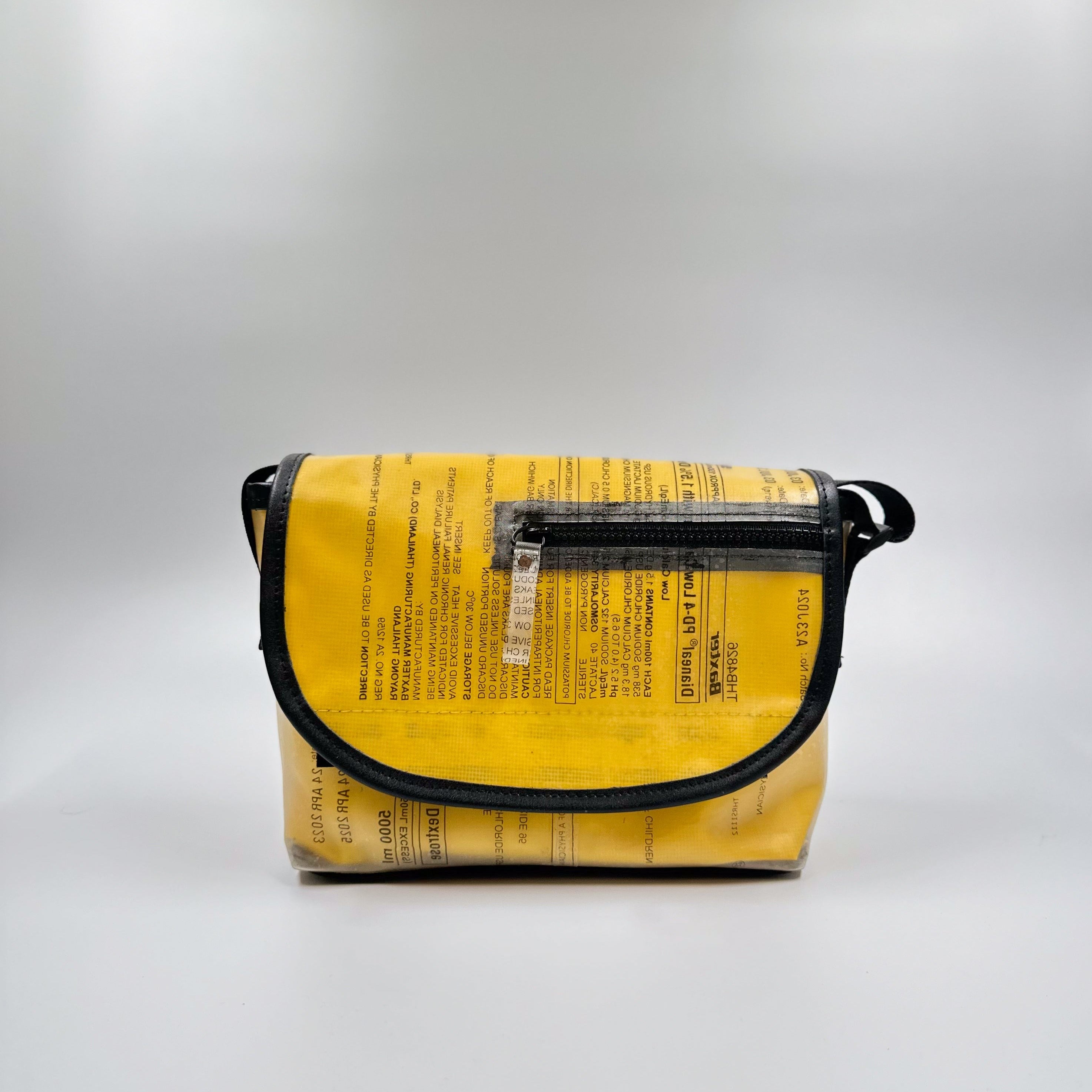 Handicraft sustainable and recycled accessory bag from Asia. The pouch is made of recycled dialysis bag and is sold online on www.qacrafts.com.