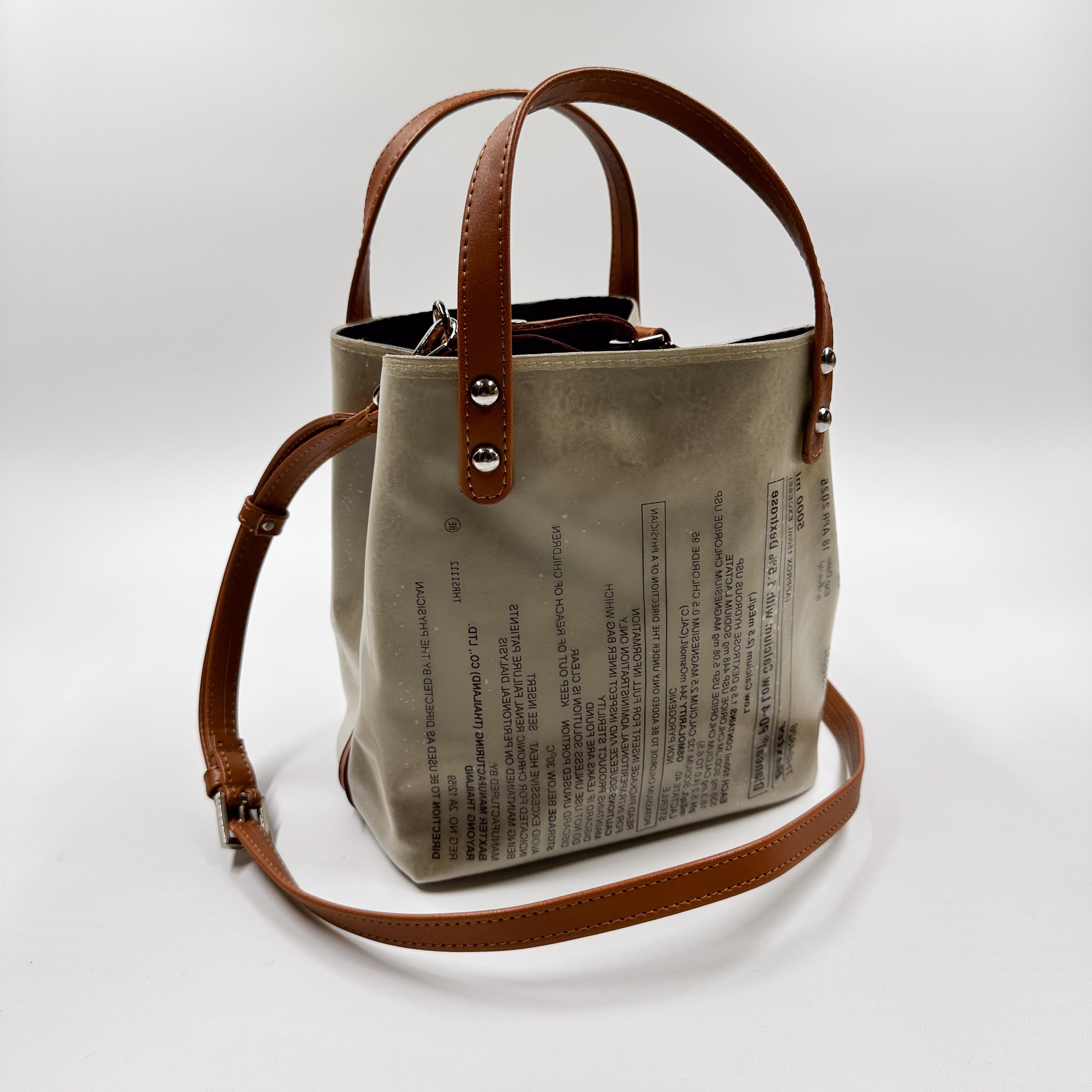 Handicraft sustainable and recycled accessory bag from Asia. The pouch is made of recycled dialysis bag and is sold online on www.qacrafts.com.