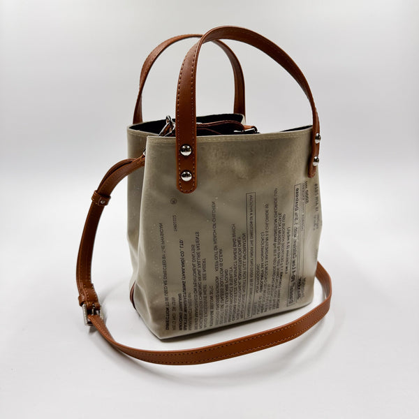 Handicraft sustainable and recycled accessory bag from Asia. The pouch is made of recycled dialysis bag and is sold online on www.qacrafts.com.