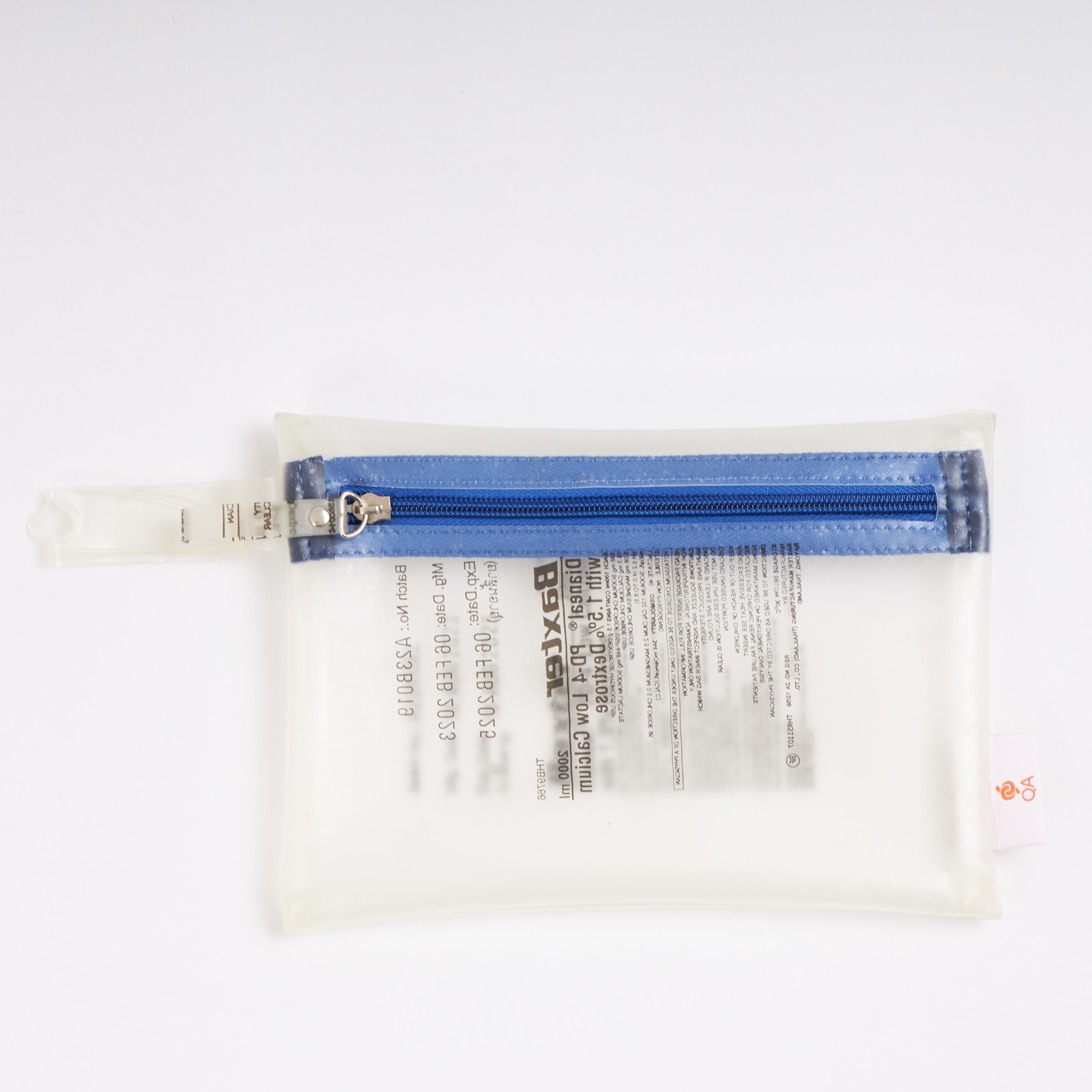 Sustainable handcraft and recycled pouch from Asia. The pouch is made of recycled dialysis bag and is sold online on www.qacrafts.com.