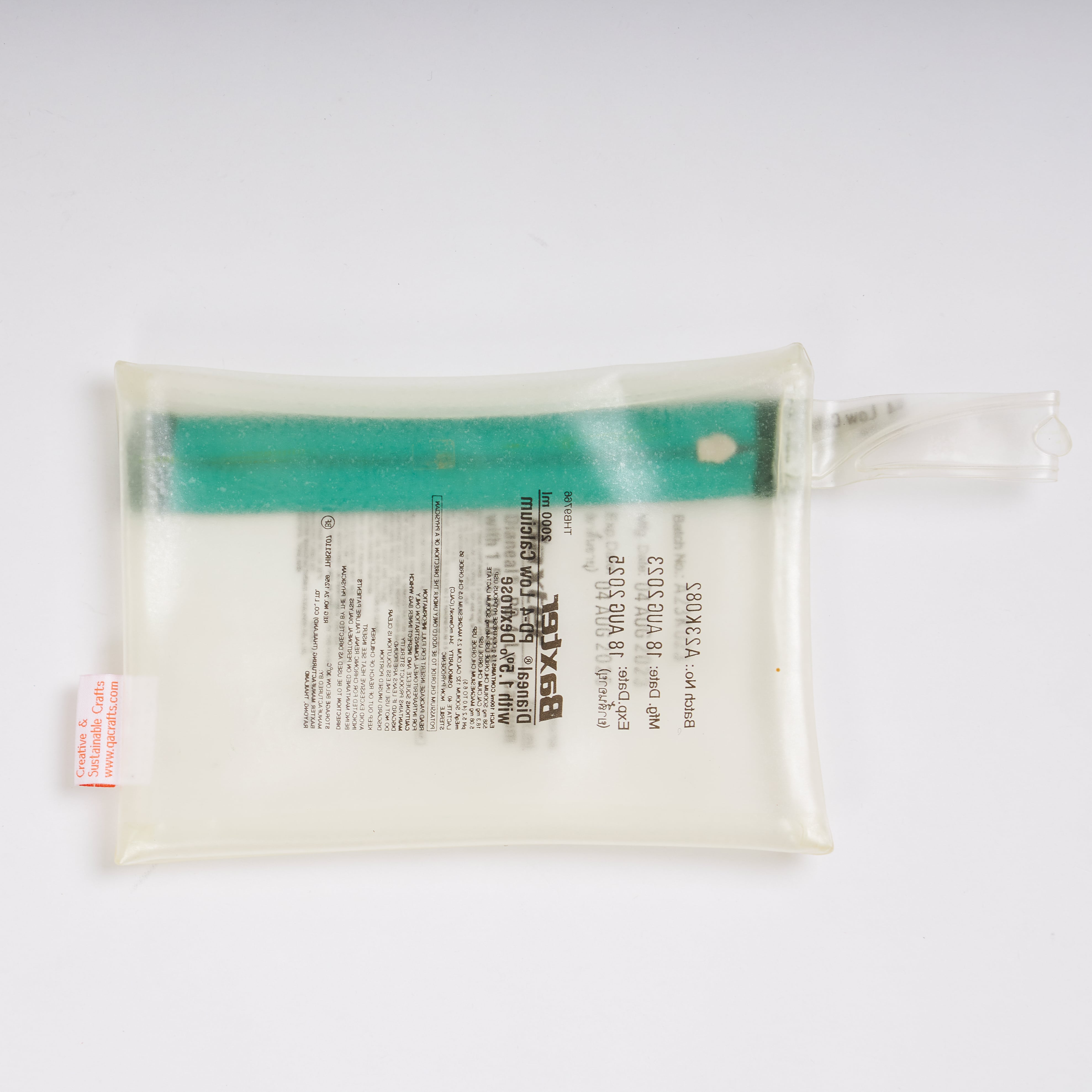 Sustainable handcraft and recycled pouch from Asia. The pouch is made of recycled dialysis bag and is sold online on www.qacrafts.com.