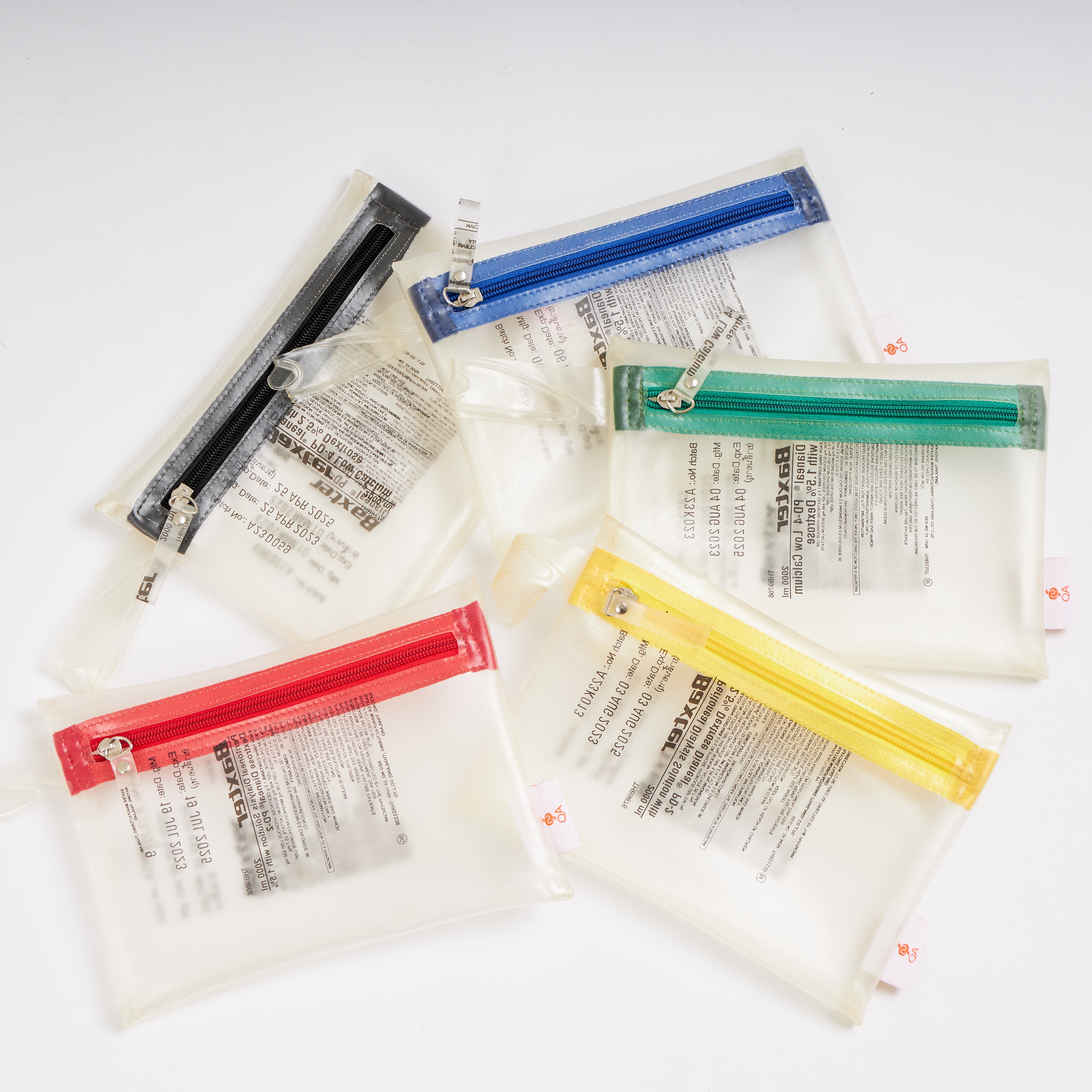 Sustainable handcraft and recycled pouch from Asia. The pouch is made of recycled dialysis bag and is sold online on www.qacrafts.com.