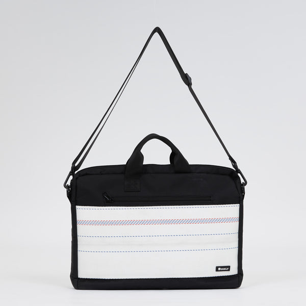 Handmade upcycled firehose bag and laptop bag. Sustainable and eco-friendly, we sell the bag on www.qacrafts.com