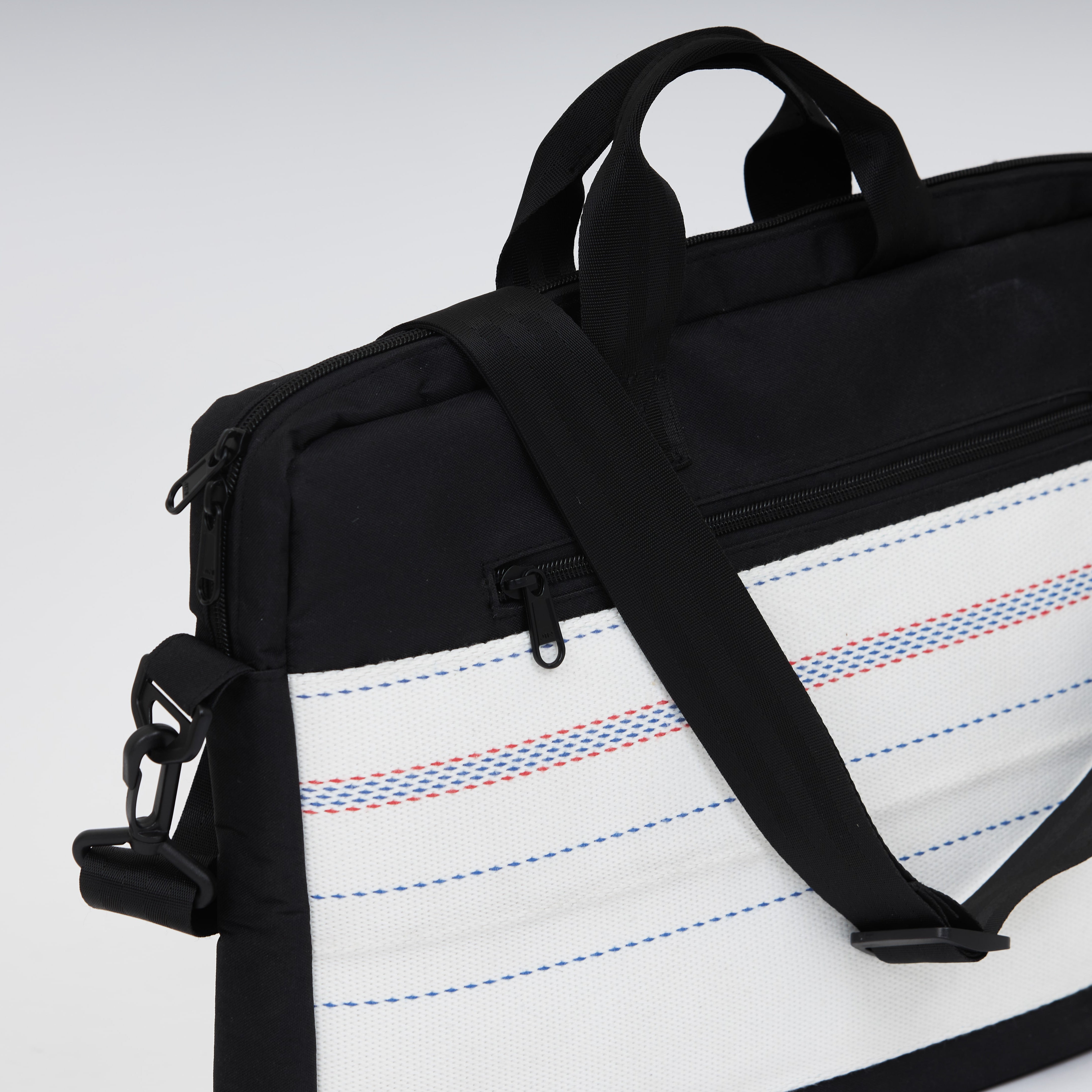 Handmade upcycled firehose bag and laptop bag. Sustainable and eco-friendly, we sell the bag on www.qacrafts.com