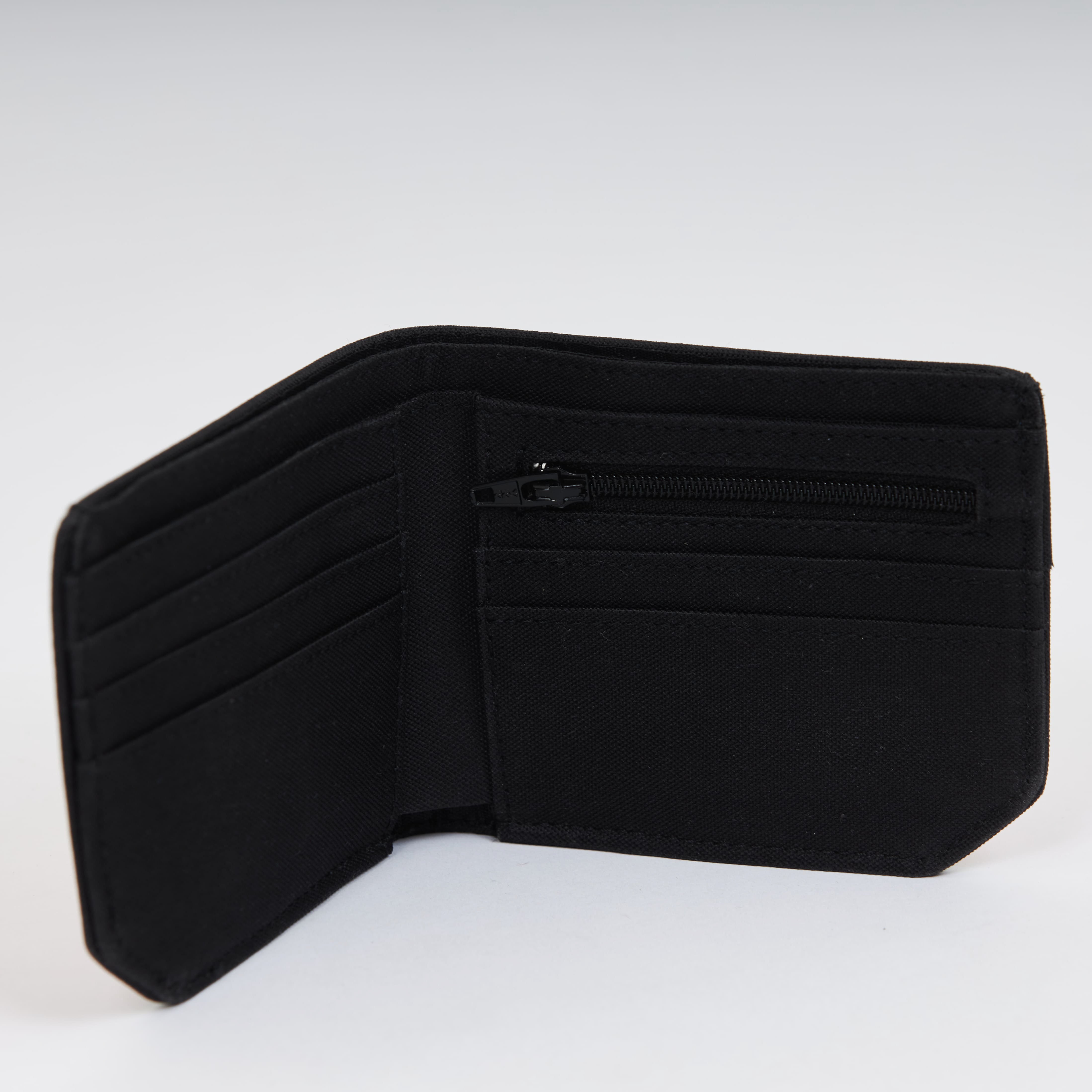 Handmade sustainable and recycled firehose wallet. The wallet is made of recycled firehose and sold online on www.qacrafts.com.
