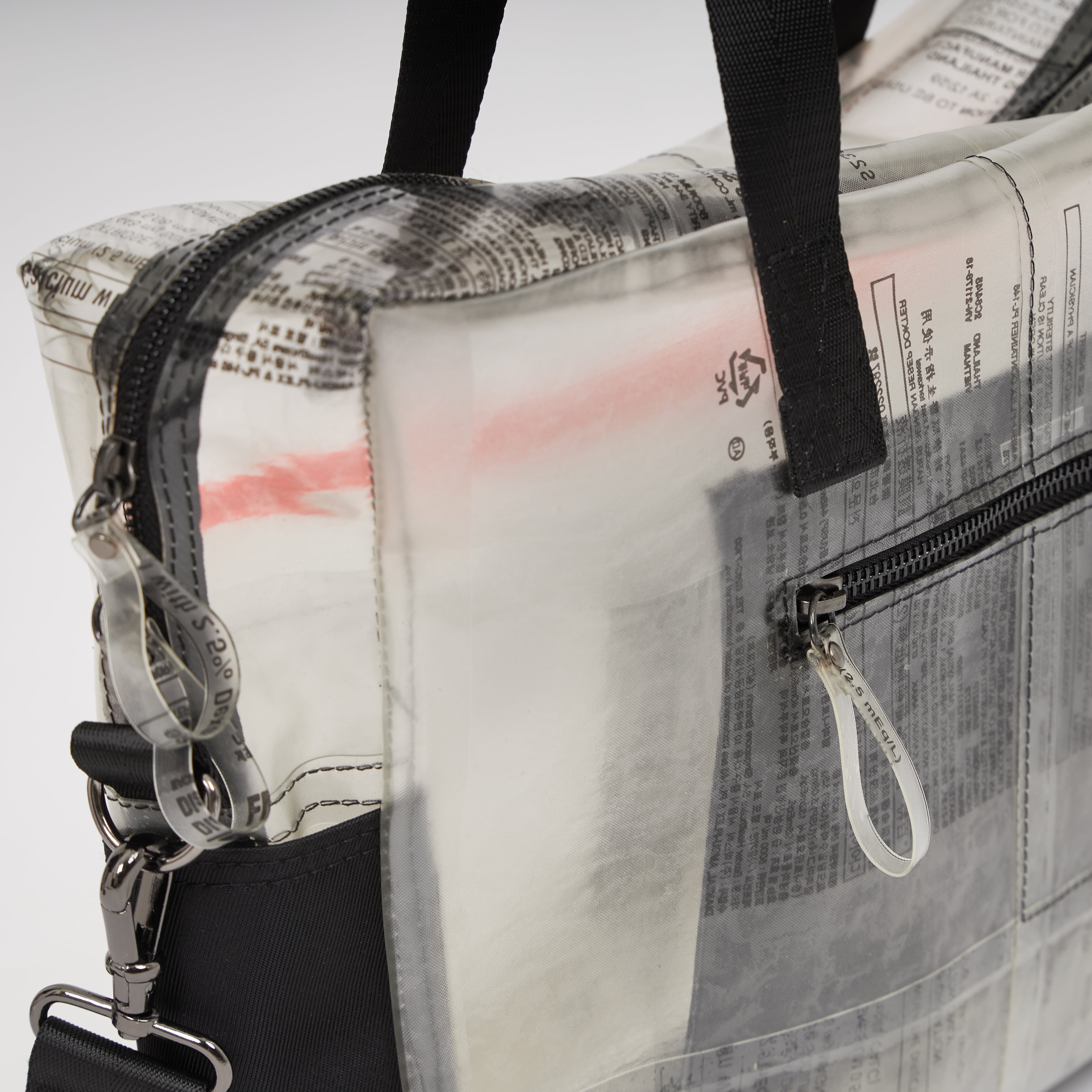 Handmade of recycled dialysis bags, it's a sustainable craft and ecofriendly. Sold by www.qacrafts.com