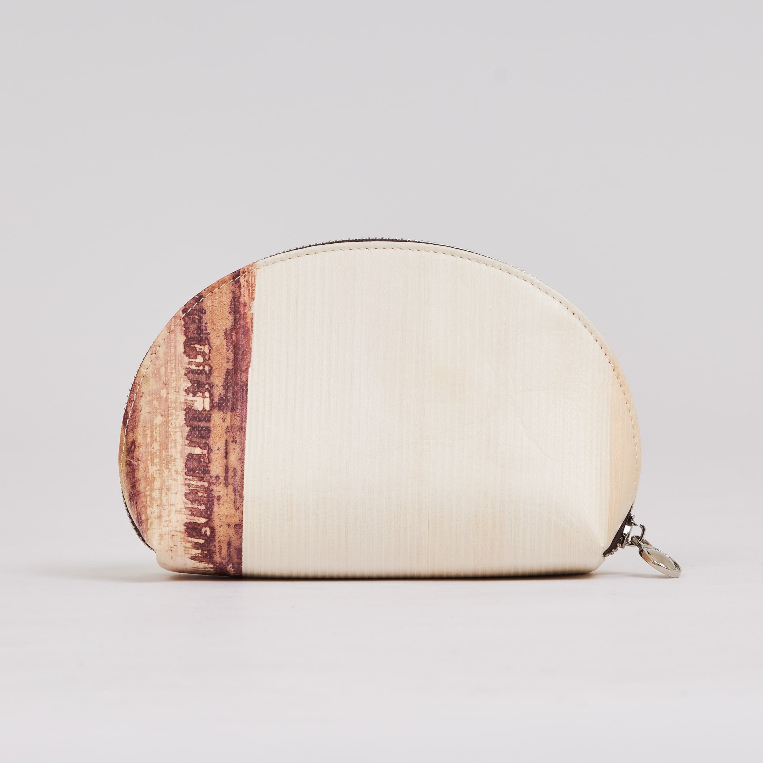 Nymphe Tanee, handmade of banana leather, a vegan, handmade, water resistant accessory. Discover more on www.qacrafts.com