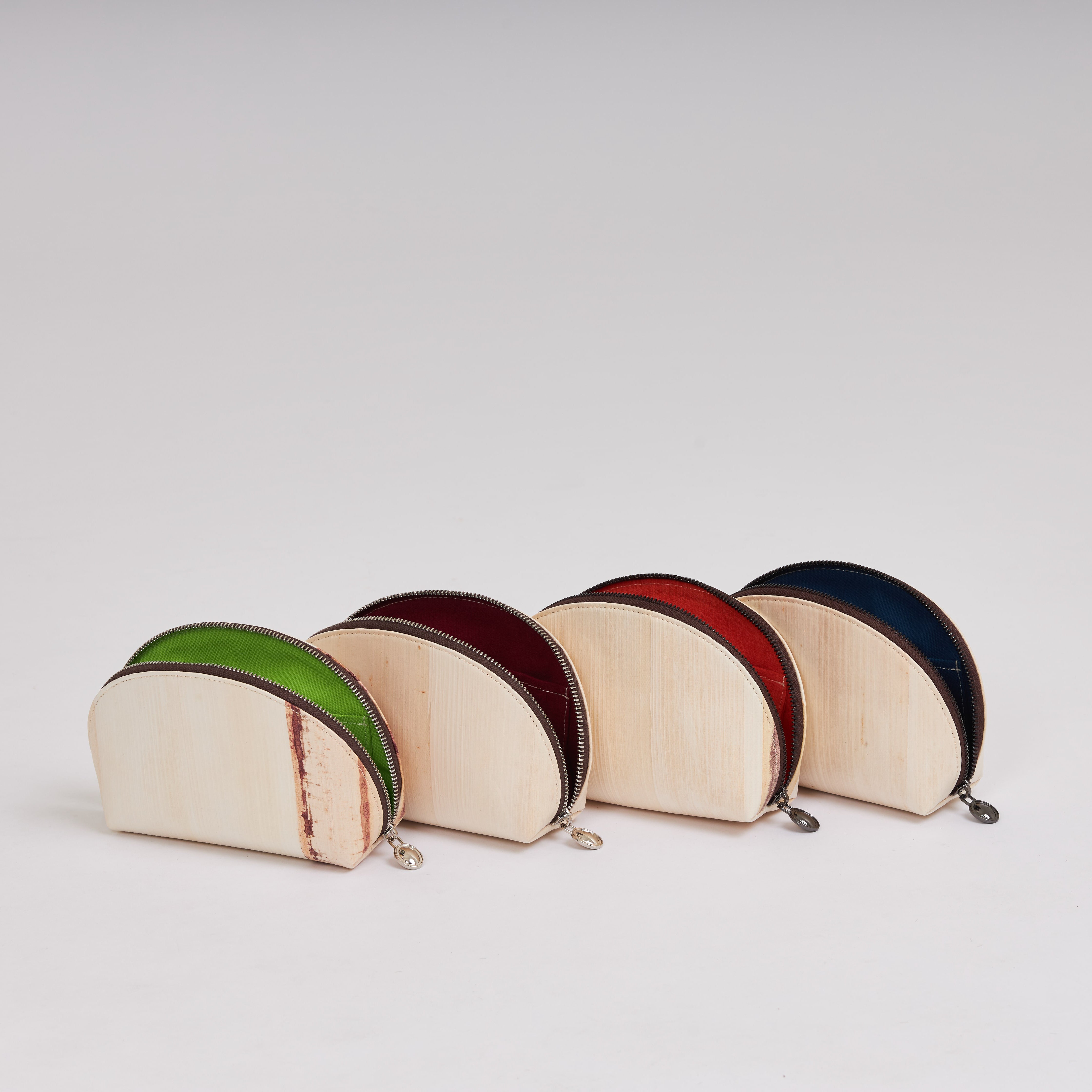 Nymphe Tanee, handmade of banana leather, a vegan, handmade, water resistant accessory. Discover more on www.qacrafts.com