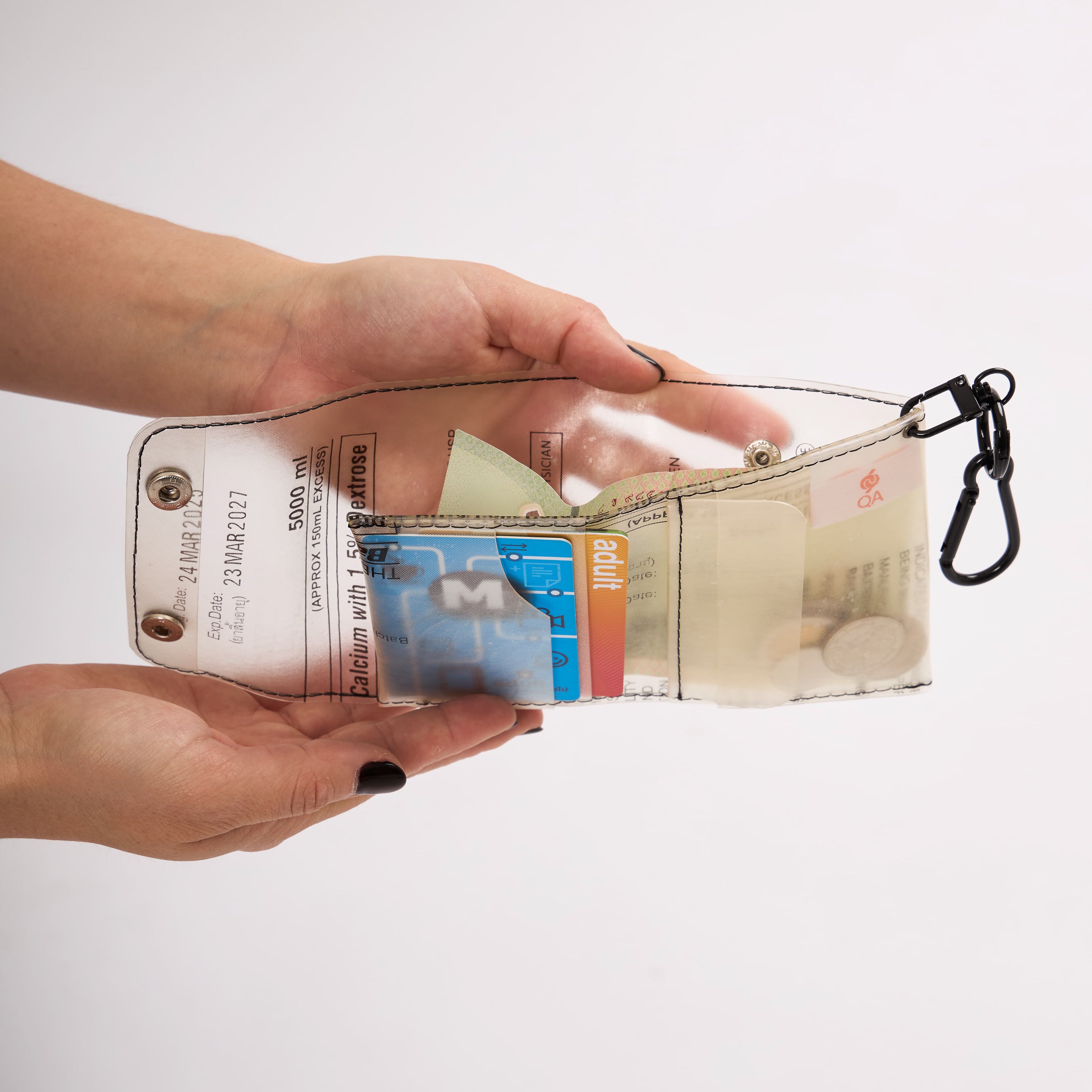 Eco-friendly wallet holding cash and cards