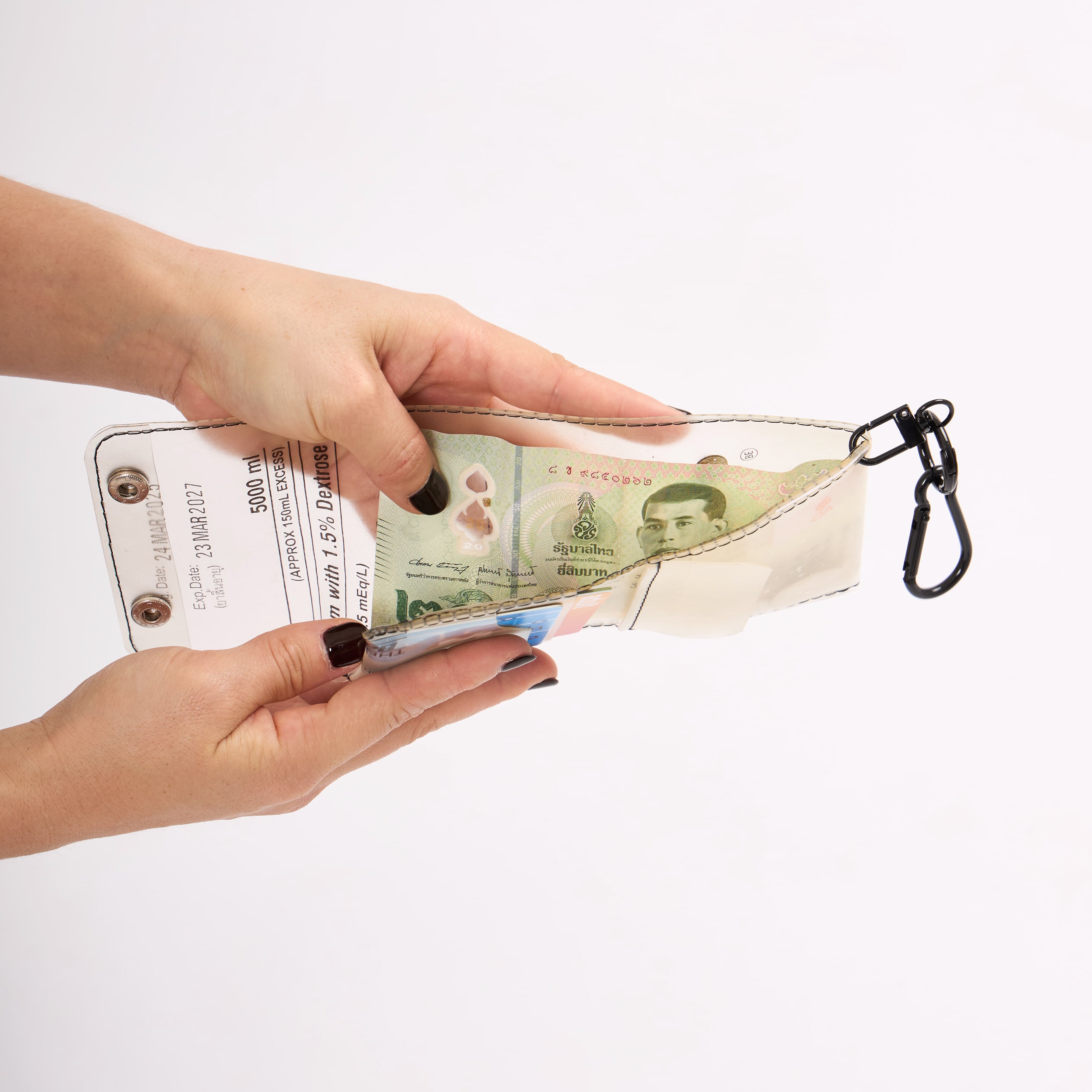 Eco-friendly wallet holding cash and cards