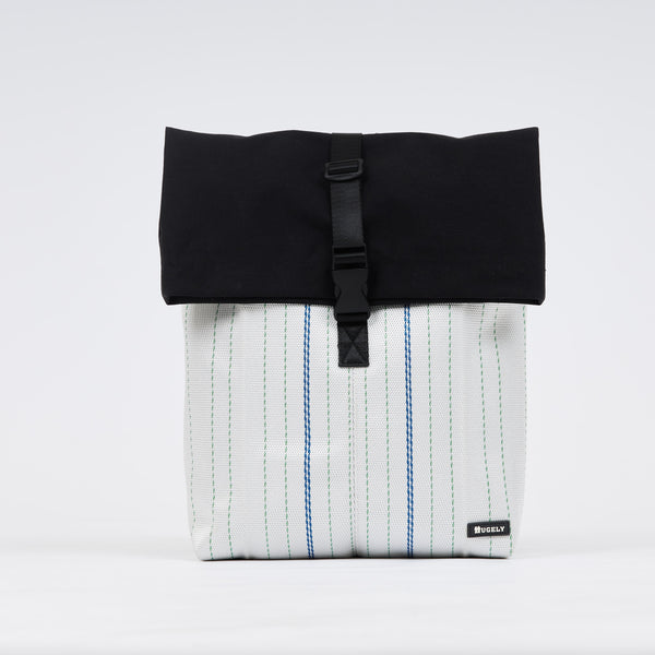 Backpack made of recycled firehose by hand. Sold on qacrafts.com