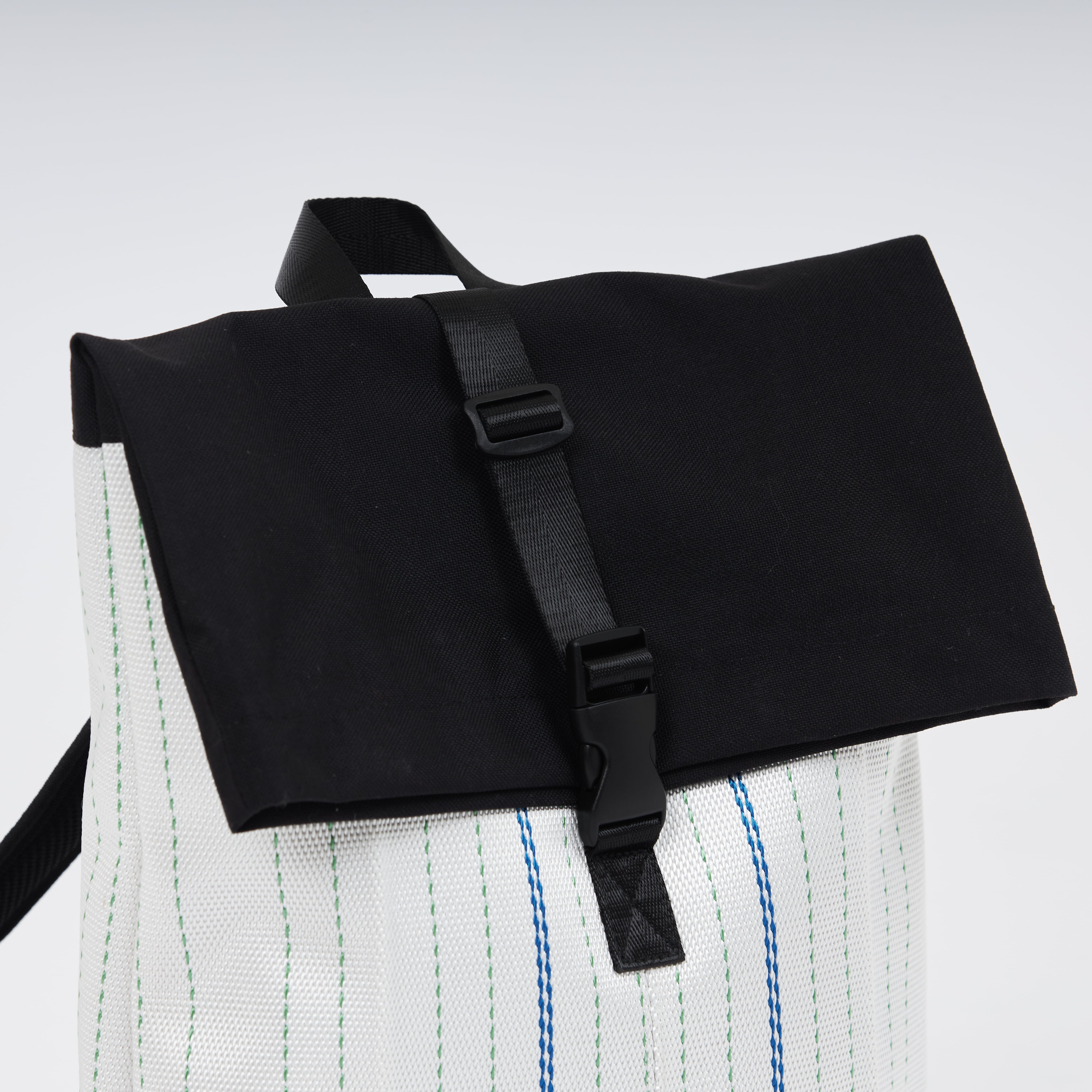 Backpack made of recycled firehose by hand. Sold on qacrafts.com