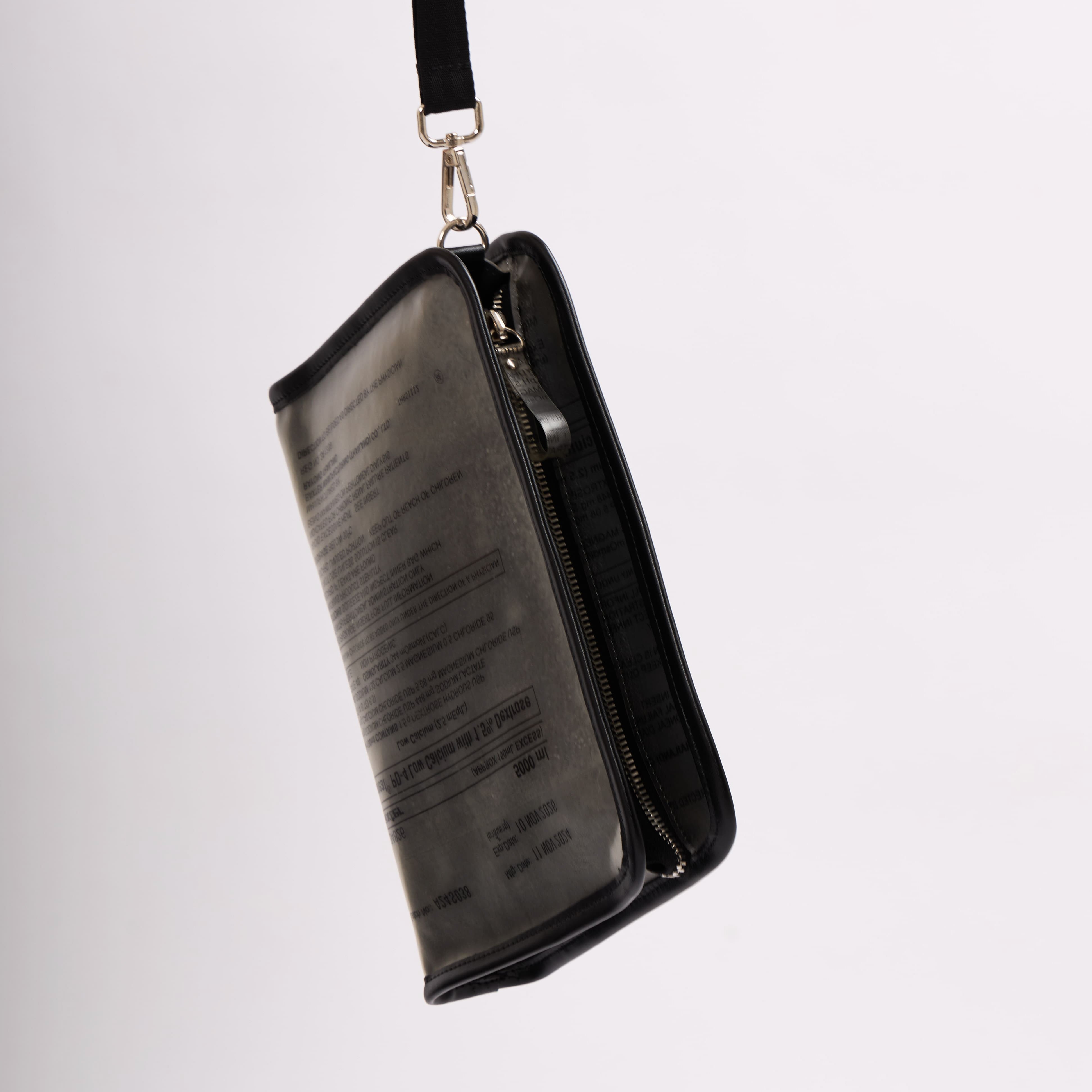 Dyophero lightweight sustainable pouch with wrist sling