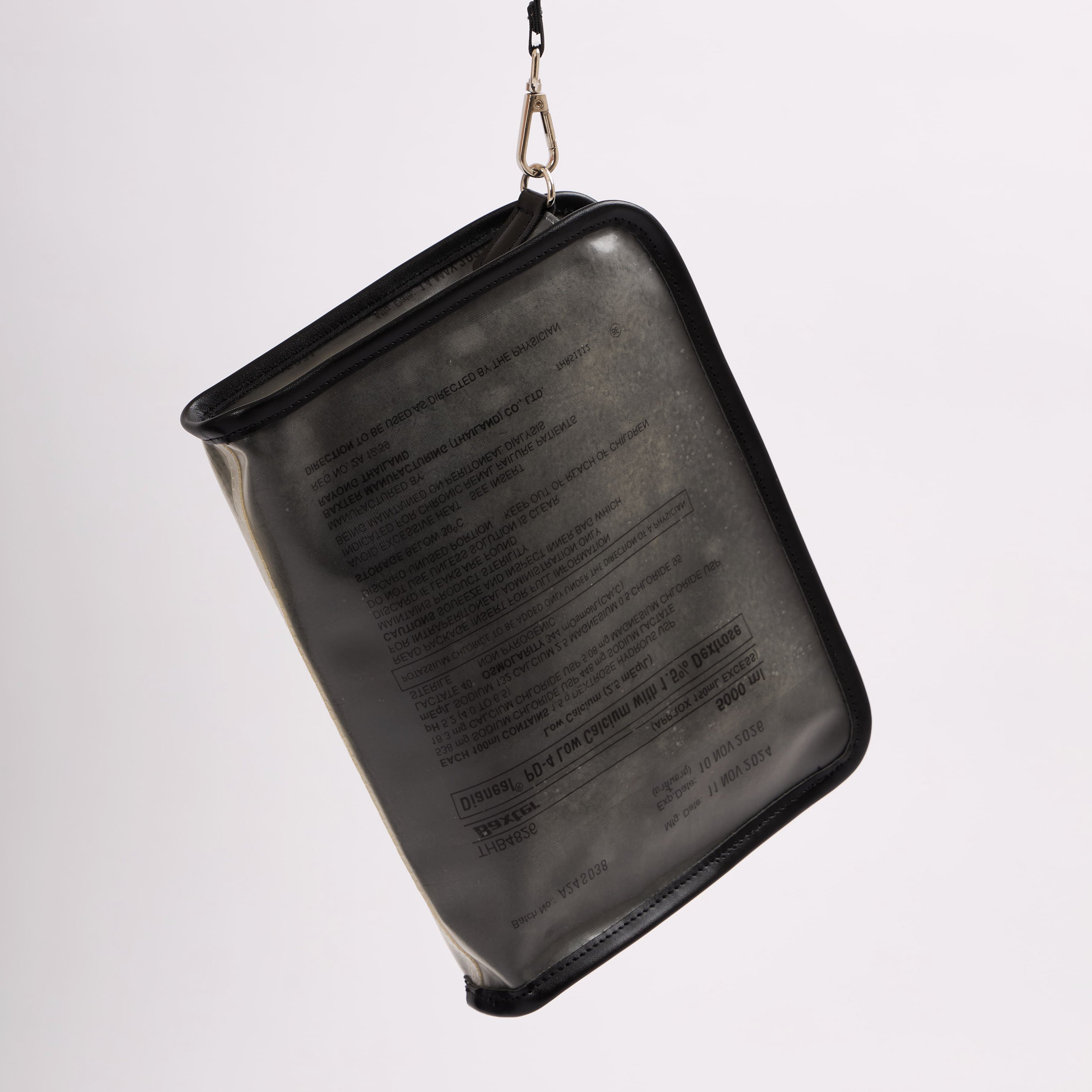 Dyophero lightweight sustainable pouch with wrist sling