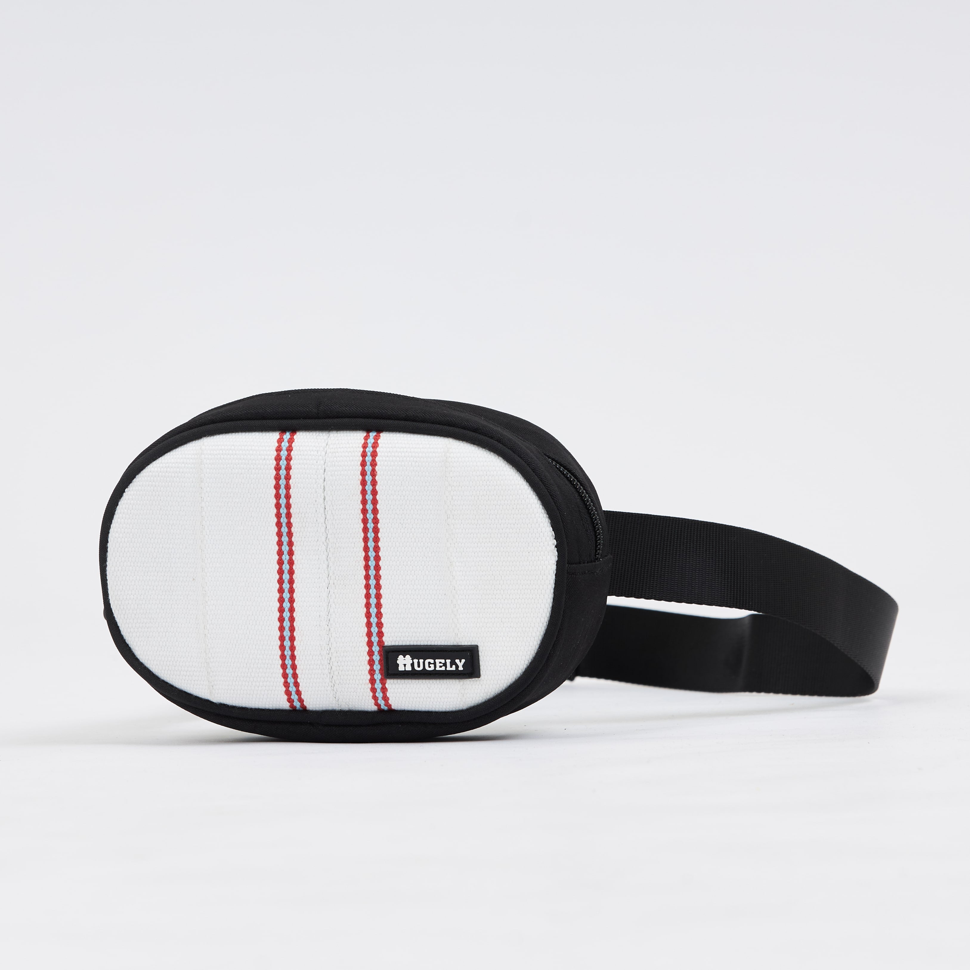 Handmade sustainable and recycled bag from Asia. The cross body bag is made of recycled firehose and sold online on www.qacrafts.com.