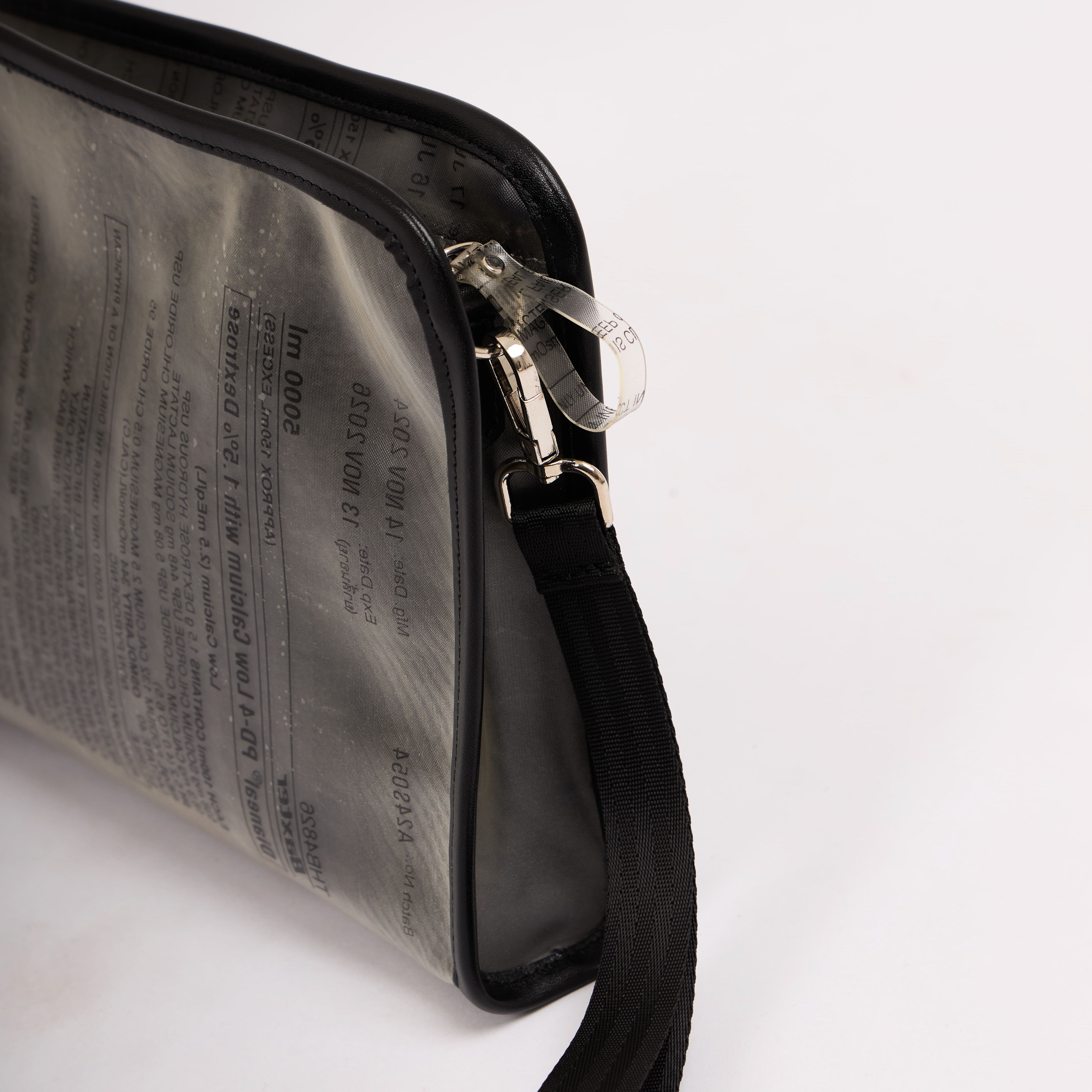 Dyophero lightweight sustainable pouch with wrist sling