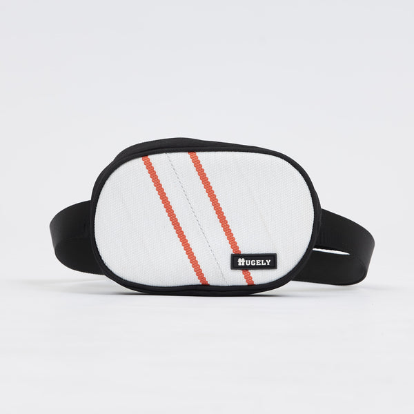 Handmade sustainable and recycled bag from Asia. The cross body bag is made of recycled firehose and sold online on www.qacrafts.com.