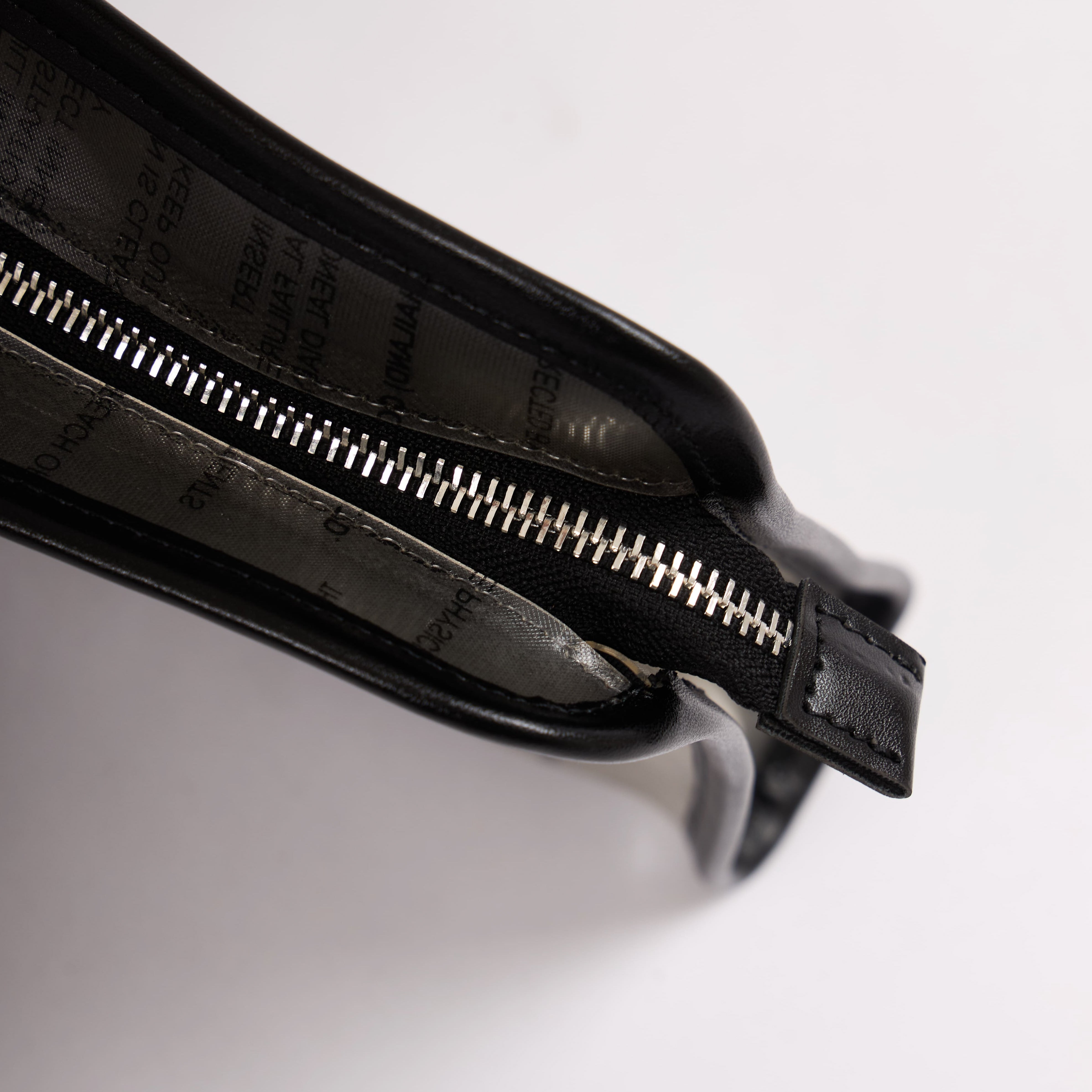 Dyophero lightweight sustainable pouch with wrist sling