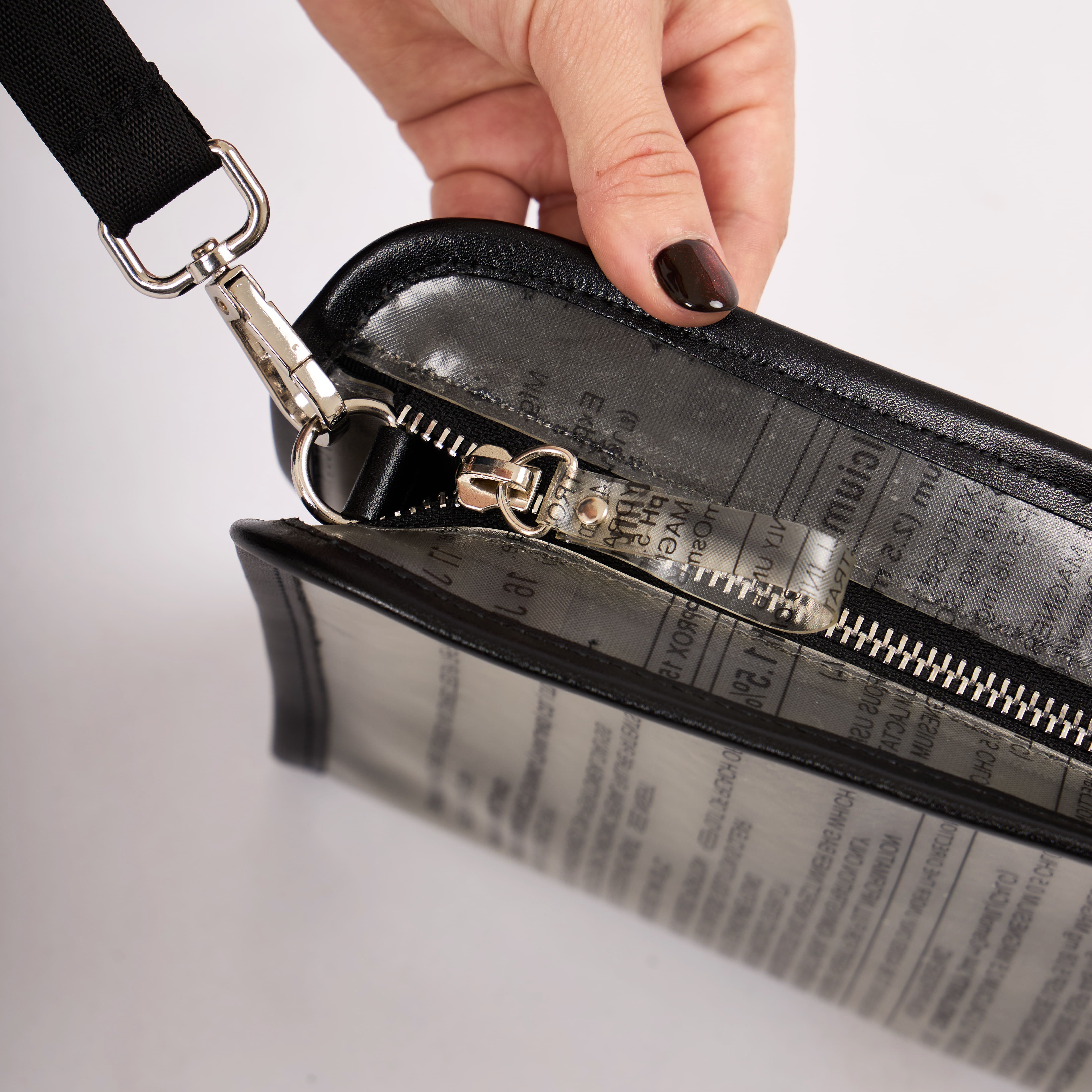 Dyophero lightweight sustainable pouch with wrist sling