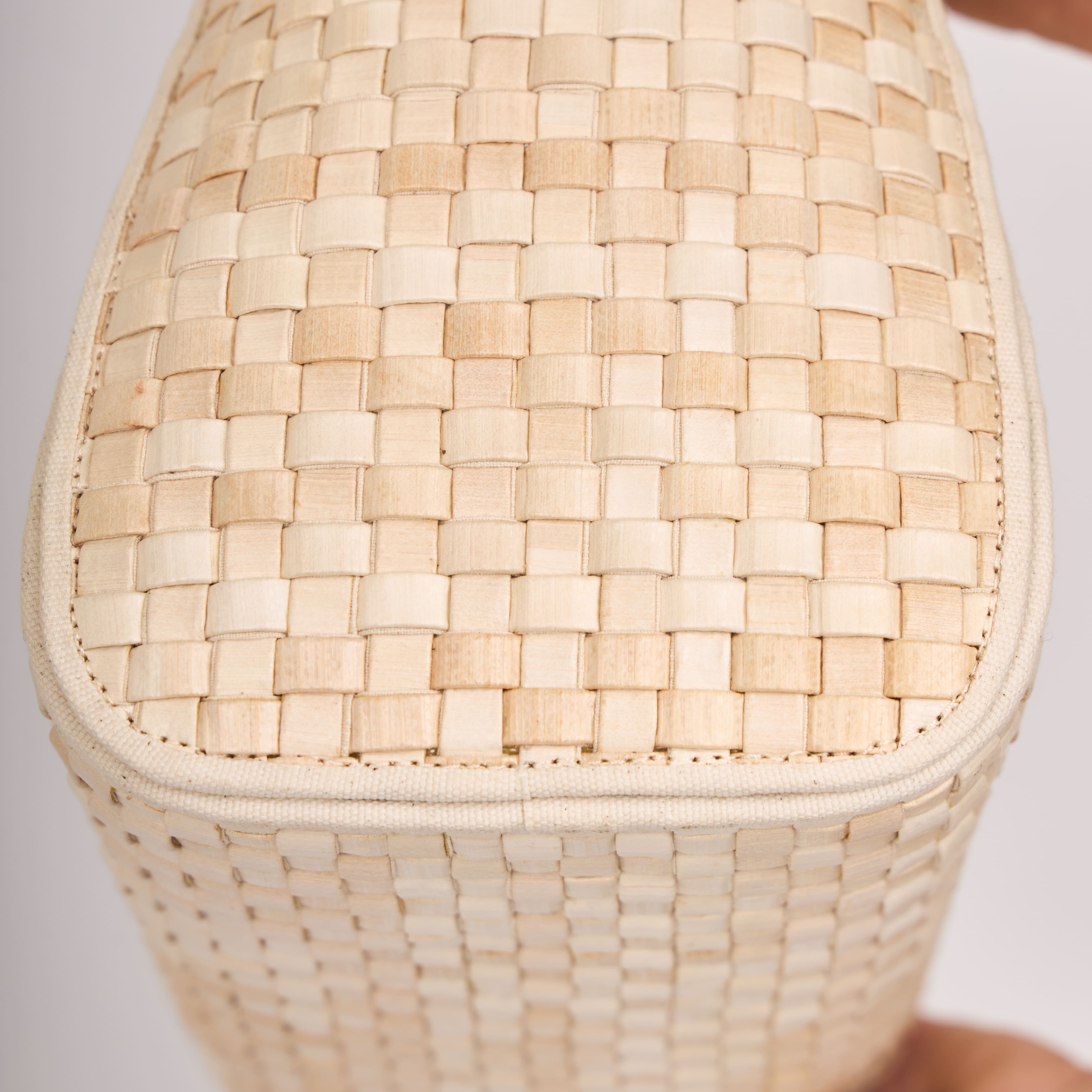 La Régente hand-woven banana leather bag with structured silhouette