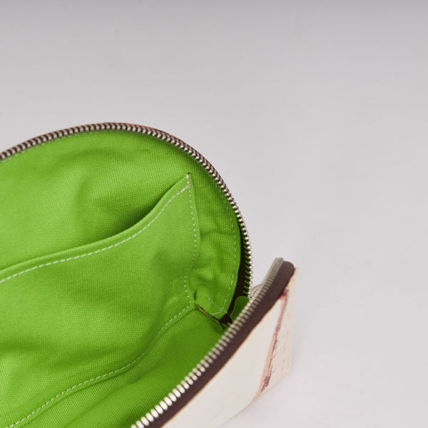 Nymphe Tanee, handmade of banana leather, a vegan, handmade, water resistant accessory. Discover more on www.qacrafts.com