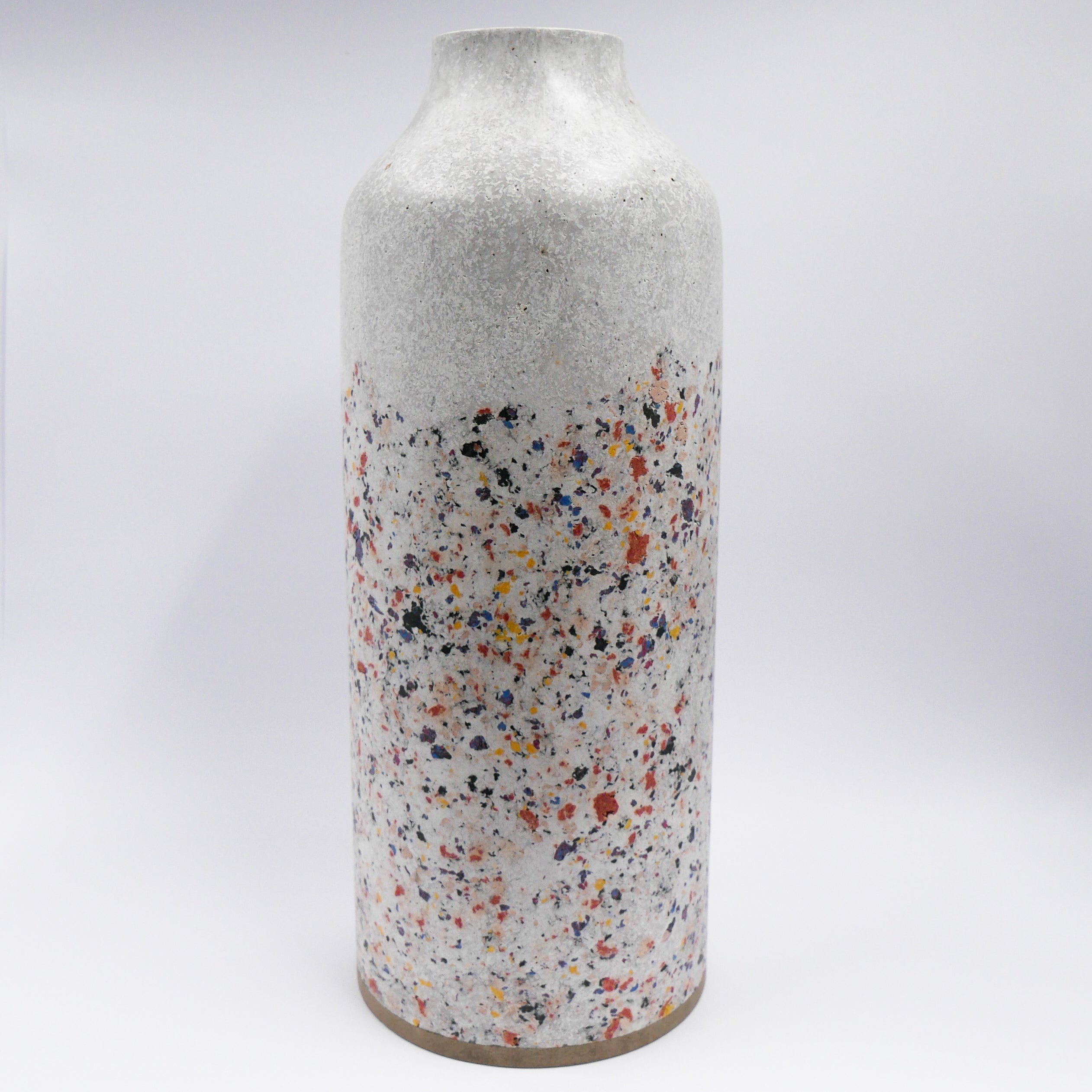 Handicraft sustainable and recycled paper vase from Asia. The home decor vase is made of recycled paper and is sold online on www.qacrafts.com.