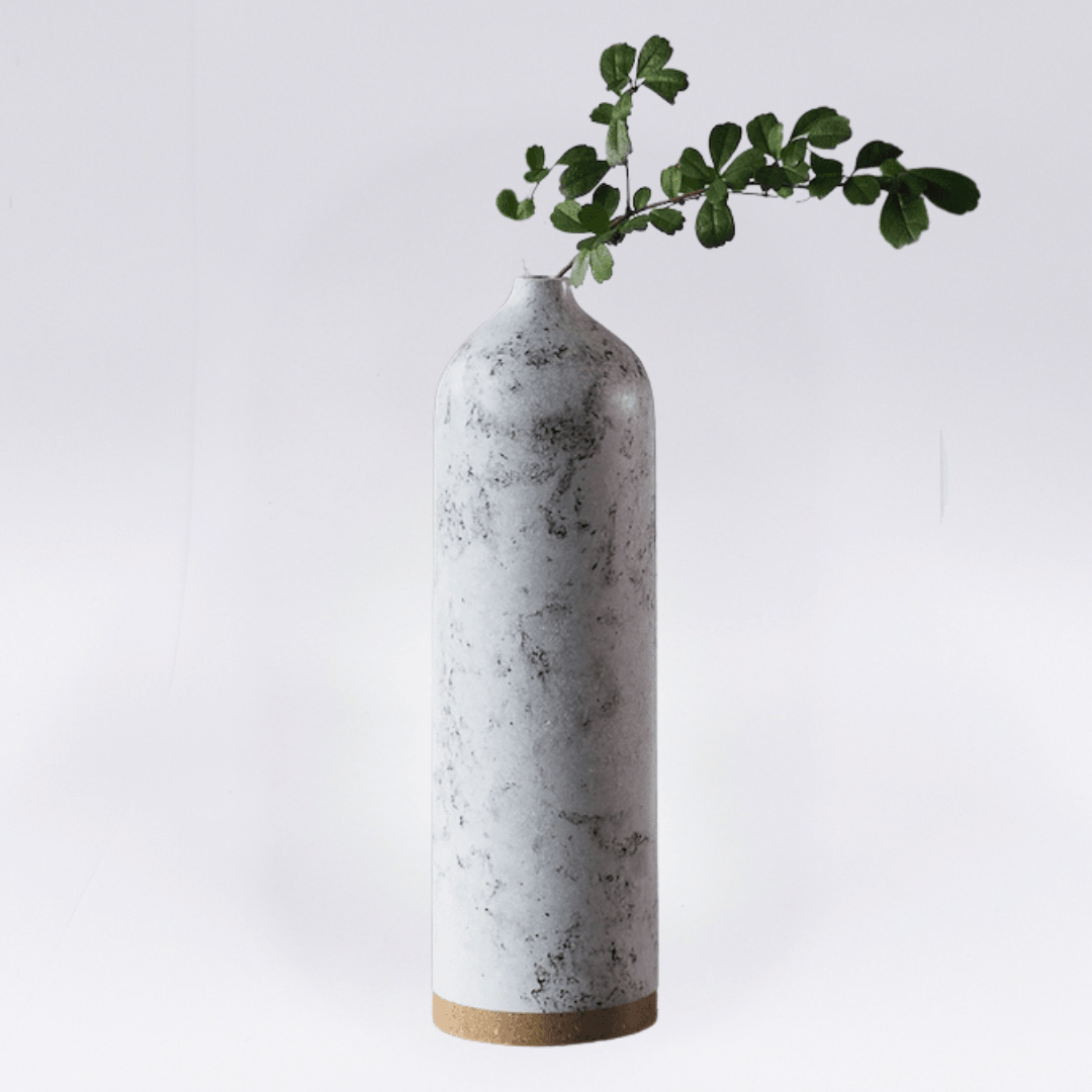 Handicraft sustainable and recycled paper vase from Asia. The home decor vase is made of recycled paper and is sold online on www.qacrafts.com.