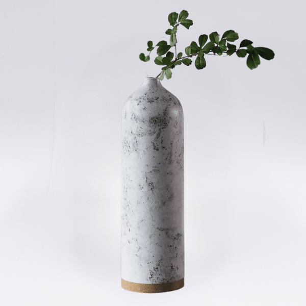 Handicraft sustainable and recycled paper vase from Asia. The home decor vase is made of recycled paper and is sold online on www.qacrafts.com.