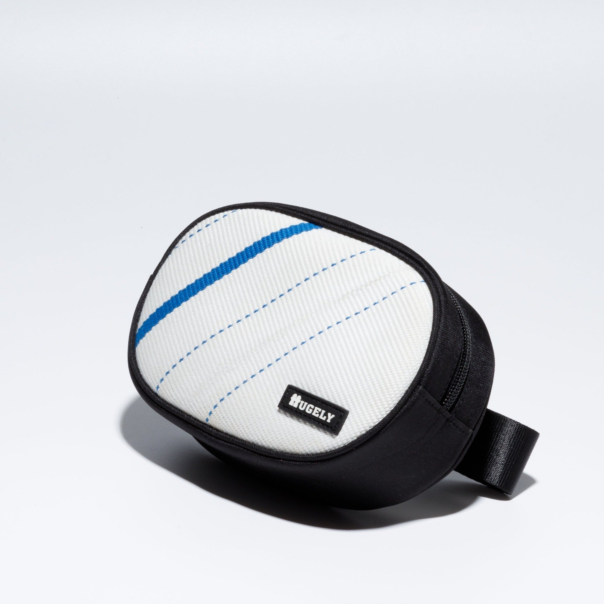 Handmade sustainable and recycled bag from Asia. The cross body bag is made of recycled firehose and sold online on www.qacrafts.com.