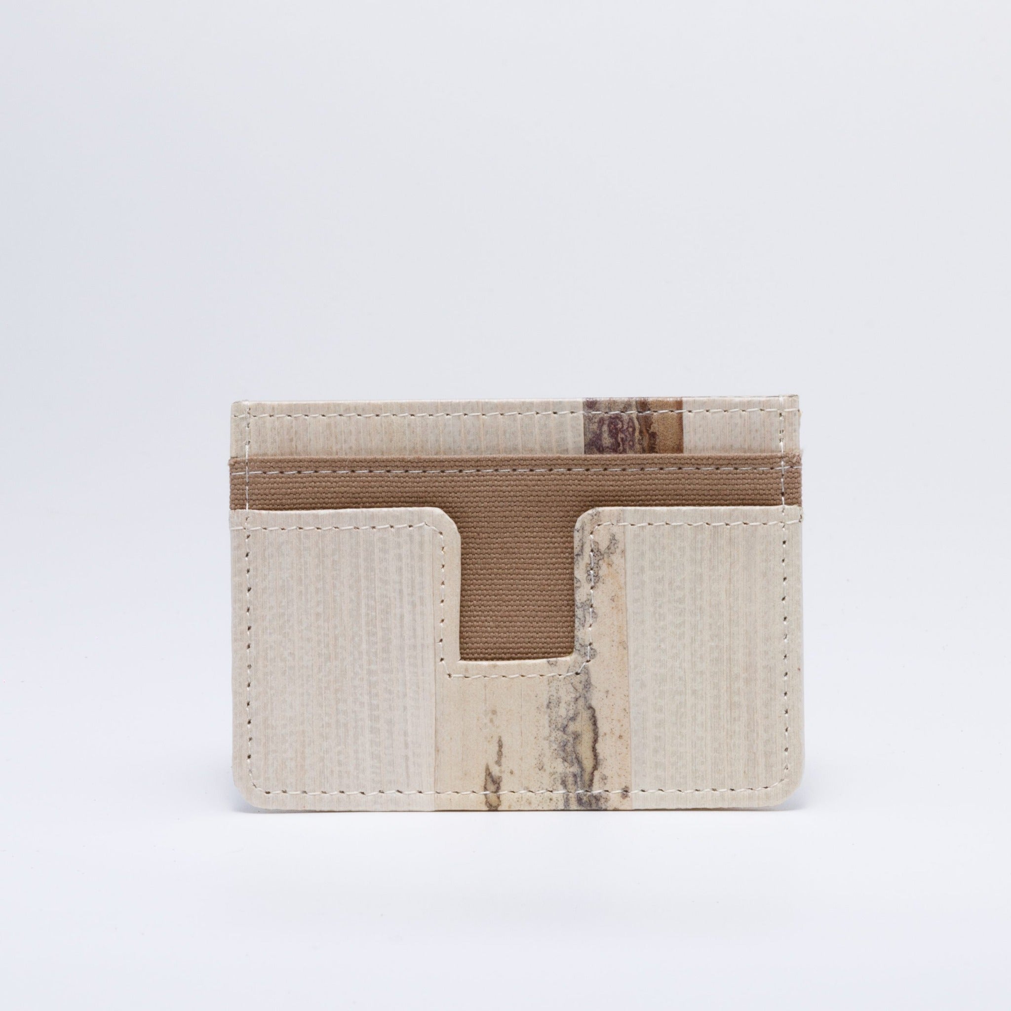 Handicraft sustainable and natural cardholder from Asia. The cardholder is made of natural, vegan and toxic-free banana tree and sold online on www.qacrafts.com.