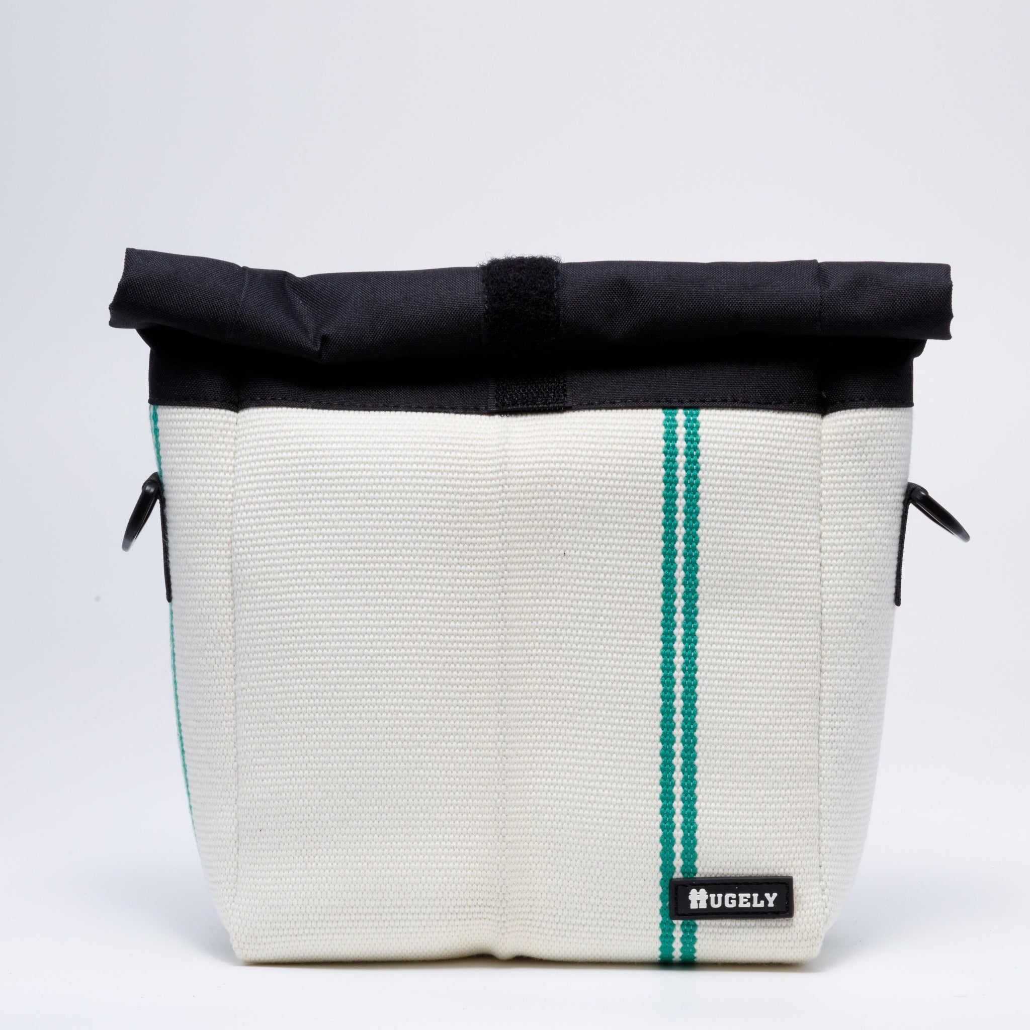 Handicraft sustainable and recycled bag from Asia. The crossbody bag is made of recycled firehose and sold online on www.qacrafts.com.