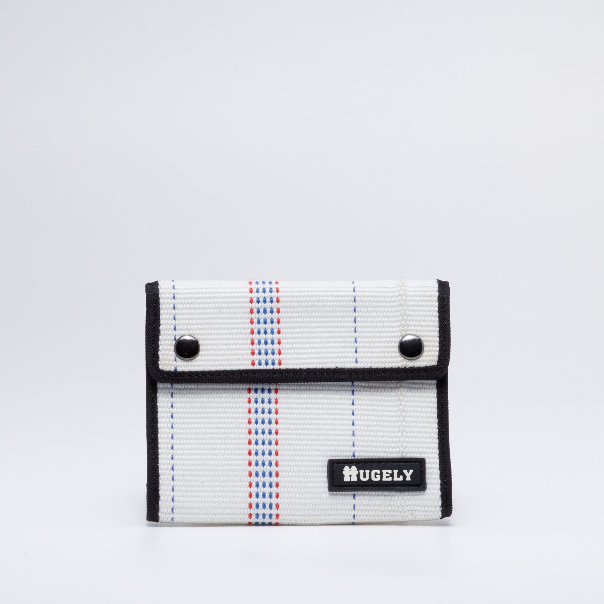 Handmade sustainable and recycled firehose wallet. The wallet is made of recycled firehose and sold online on www.qacrafts.com.