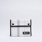 Handmade sustainable and recycled firehose wallet. The wallet is made of recycled firehose and sold online on www.qacrafts.com.