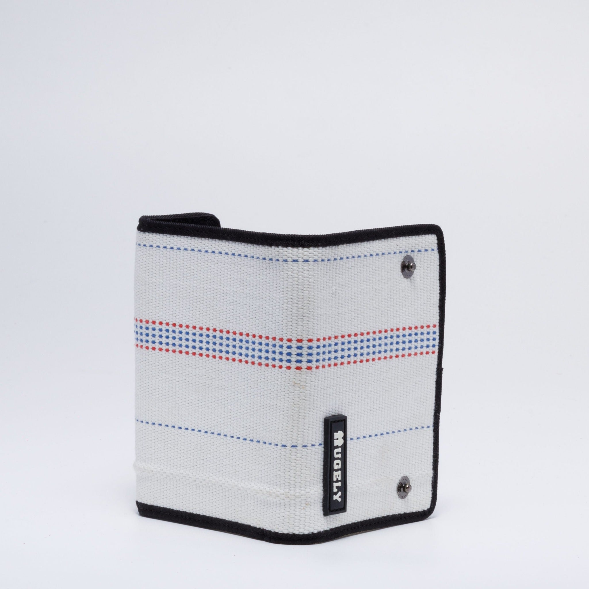 Handmade sustainable and recycled firehose wallet. The wallet is made of recycled firehose and sold online on www.qacrafts.com.