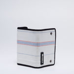 Handmade sustainable and recycled firehose wallet. The wallet is made of recycled firehose and sold online on www.qacrafts.com.