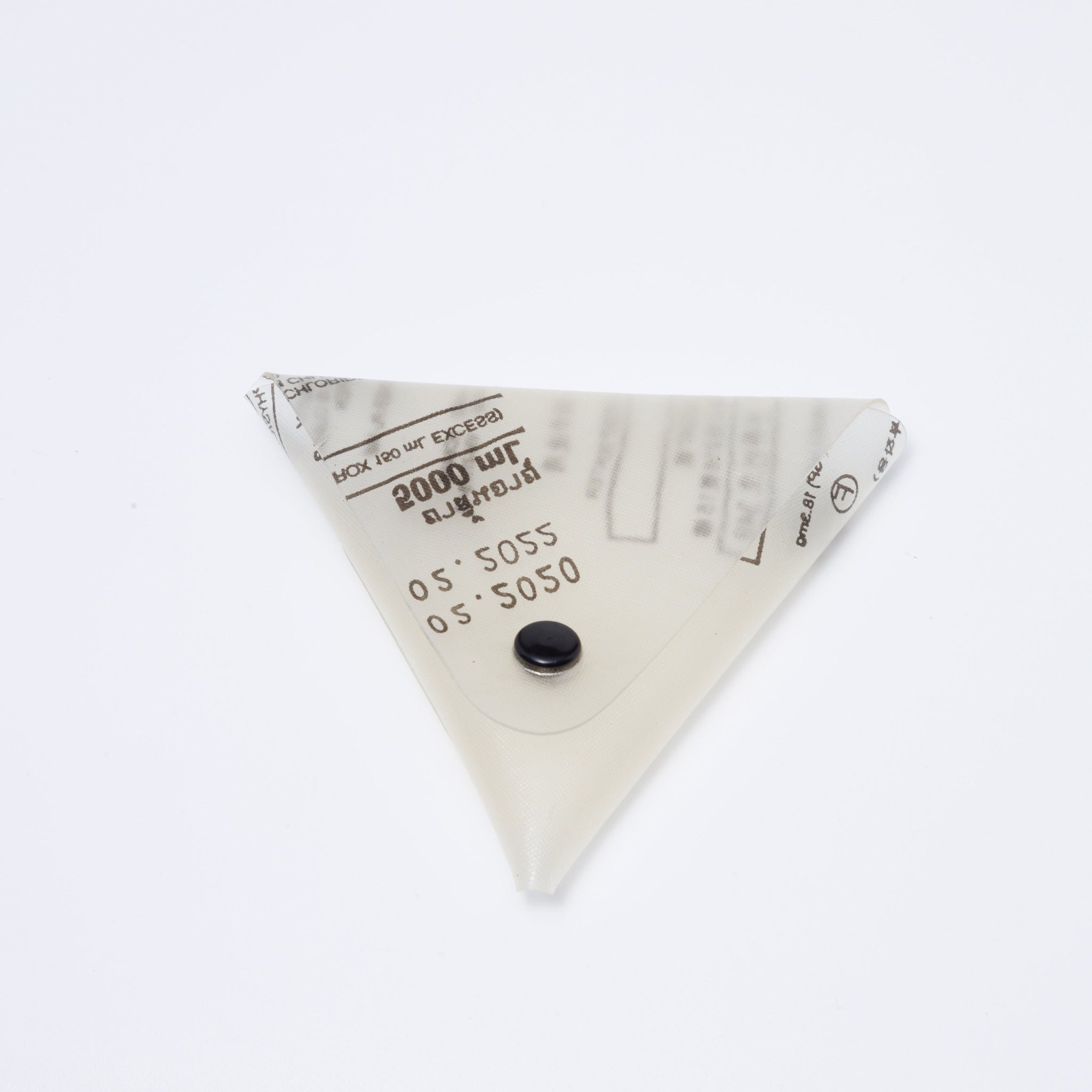 Handicraft sustainable and recycled pouch from Asia. The pouch is made of recycled dialysis bag and is sold online on www.qacrafts.com.