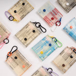 Eco-friendly wallet holding cash and cards