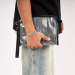 Dyophero lightweight sustainable pouch with wrist sling