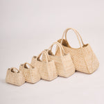 La Régente hand-woven banana leather bag with structured silhouette