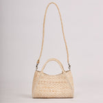La Régente hand-woven banana leather bag with structured silhouette